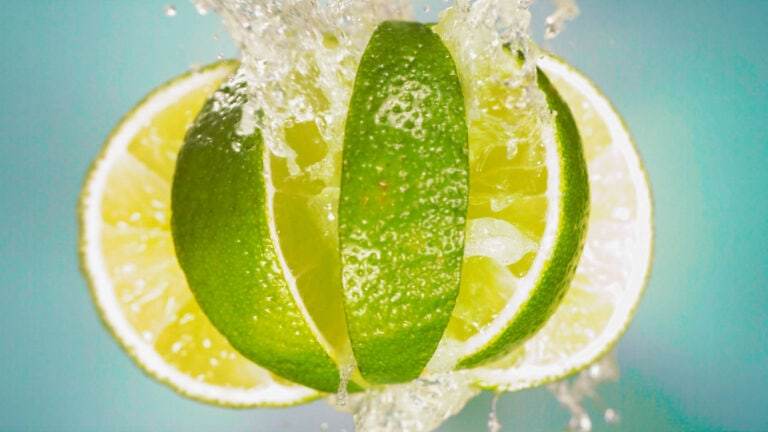 A lime bursting with lime juice.