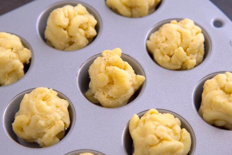 Transfer mac and cheese balls to muffin tins or a baking sheet and freeze for 15-20 minutes to firm up.