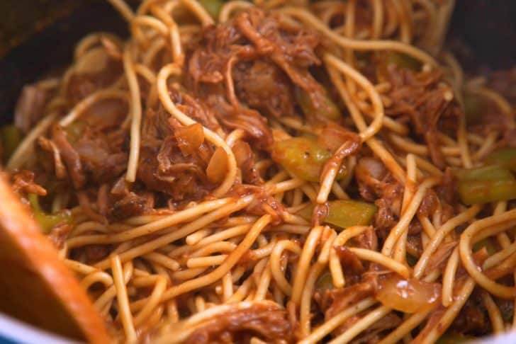 Add cooked spaghetti noodles and toss well to coat.
