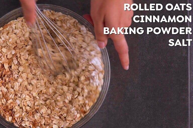 In a bowl, whisk to combine the rolled oats and dry ingredients.