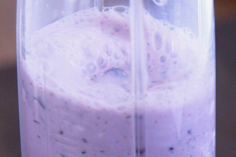 Add all blueberry smoothie ingredients to a blender and blend.