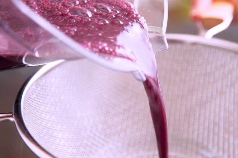 Strain mixture through a fine mesh sieve to remove pulp.