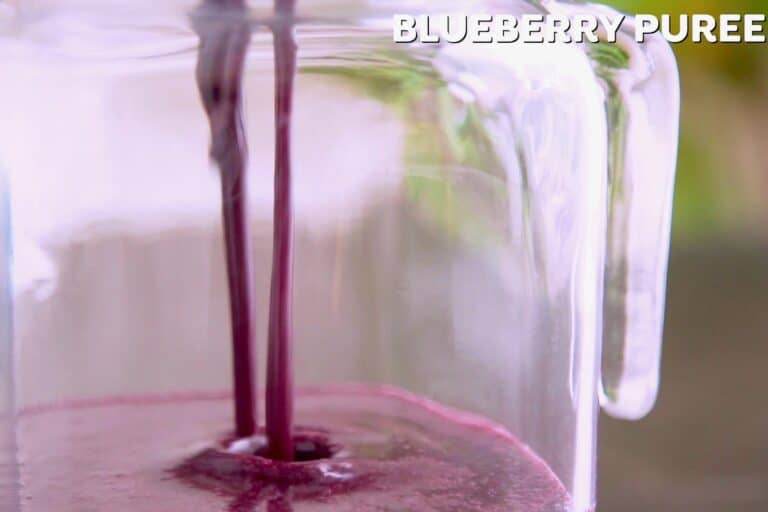 Add blueberry puree to a pitcher (or strain directly into pitcher).