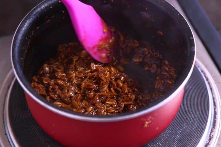 Cook oatmeal in prune juice or liquid of choice.