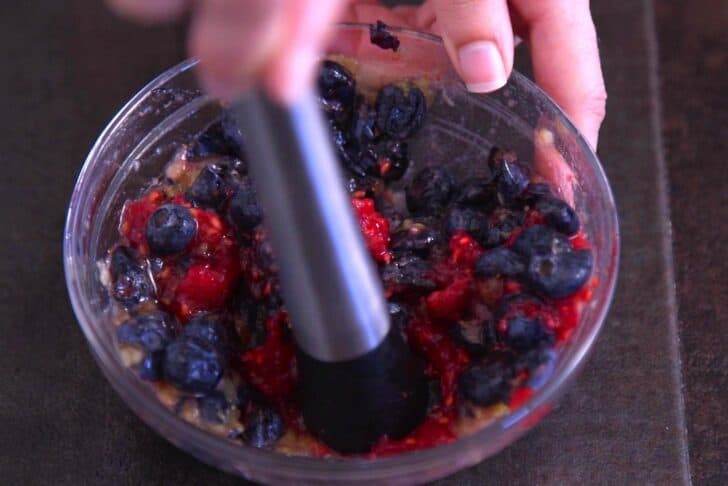 Muddle fresh berries.