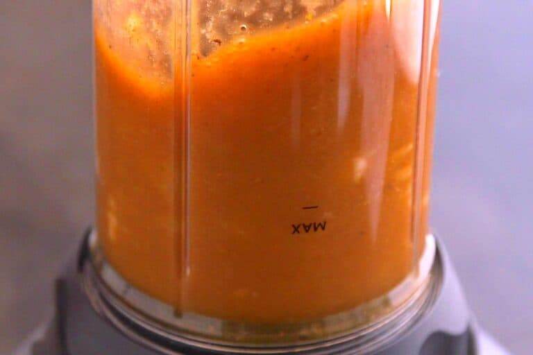 Add canned pumpkin smoothie ingredients to a blender and blend until smooth.