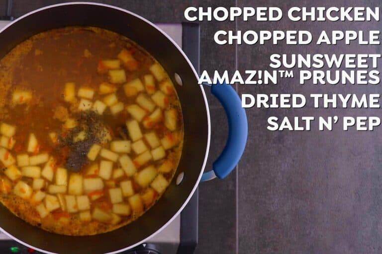 Add cooked chicken into curry soup, along with chopped apple, prunes, and seasonings. Simmer for 15 minutes.