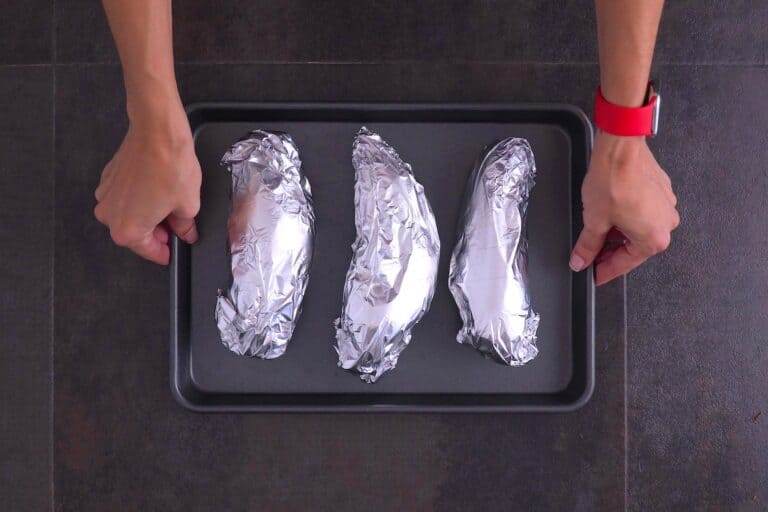 Wrap each sweet potato in foil, place on a baking sheet, and roast at 425°F for 45-60 minutes.