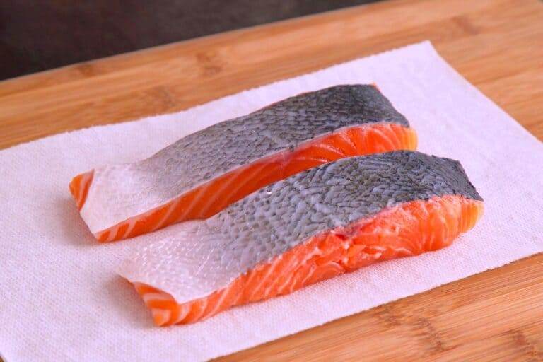 Rest salmon filets at room temperature for at least 10 minutes before cooking.