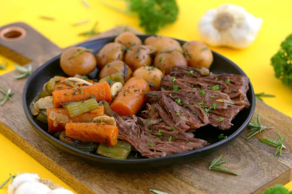 Dutch oven pot roast with potatoes and carrots