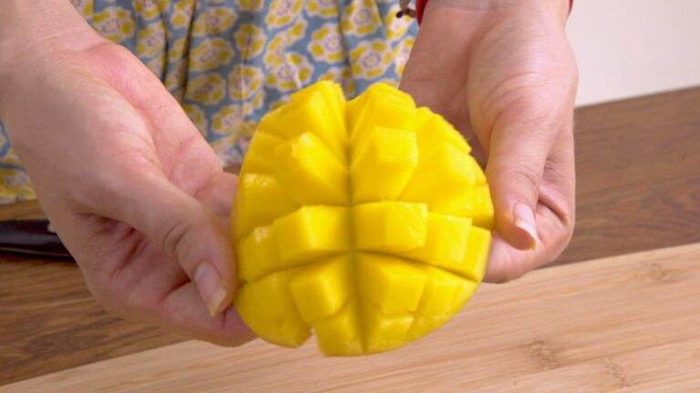 Remove cubed mango from skin.