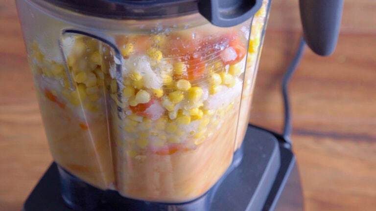Blending the soup ingredients together in the blender after boiling.