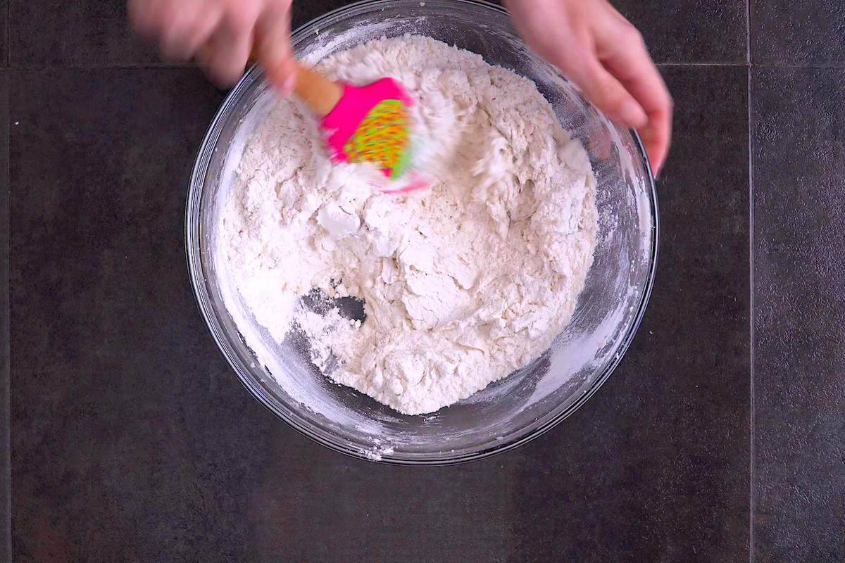Stir dry ingredients into wet mixture until combined, forming a dough.