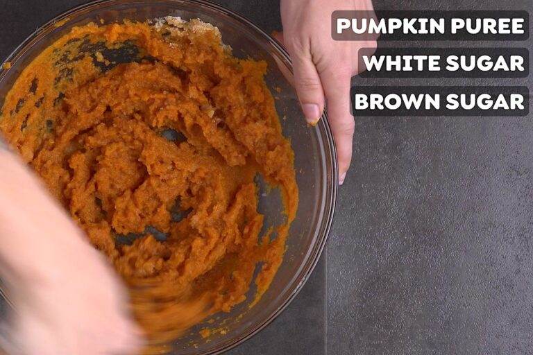 Whisk together pumpkin puree, white sugar, and brown sugar in a large bowl, until integrated.