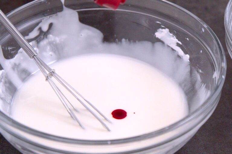 Use red food coloring to make pink frosting.