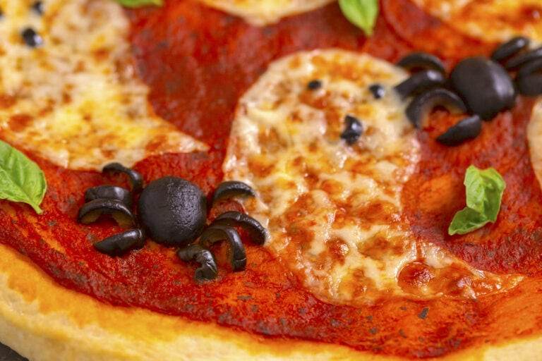Spooky Pizza with Olive Spiders