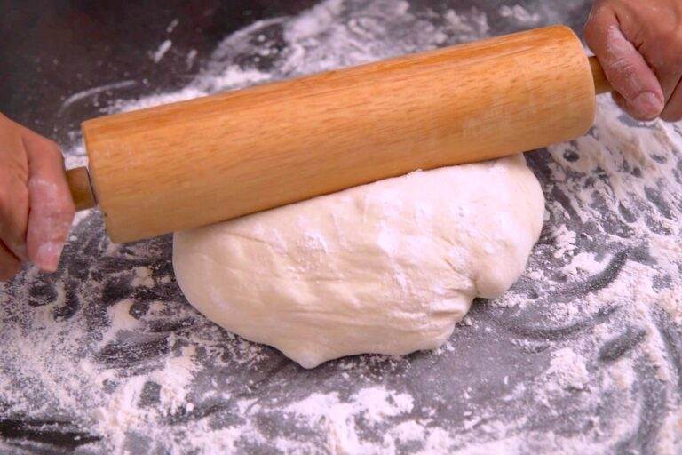 Let dough rest at room temperature for 30-60 minutes. Then, flour a surface and work dough in your hands a bit to remove any bubbles. Roll dough with a rolling pin into desired shape.