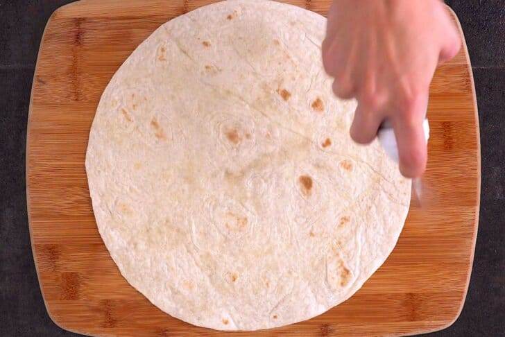 Spray tortilla of choice on both sides with cooking spray.