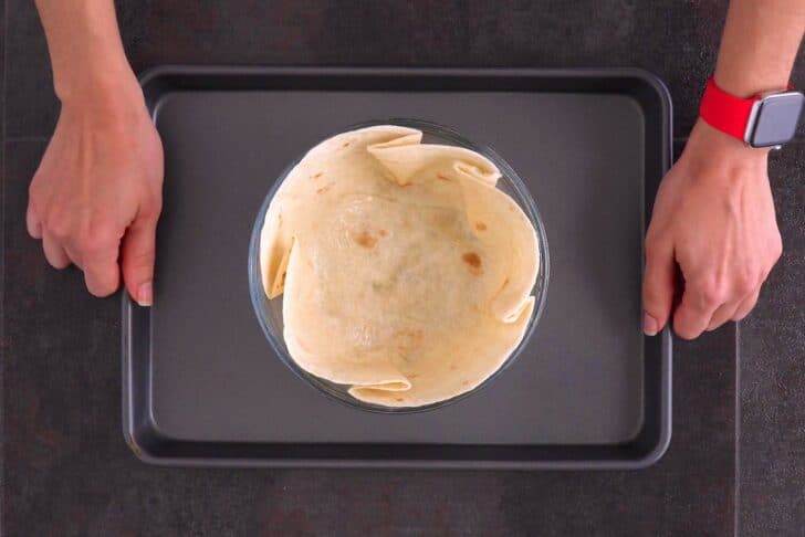Transfer bowl to a sheet pan and bake tortilla bowls at 375°F (190°) for 15-20 minutes.