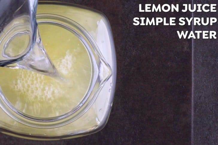 Combine fresh lemon juice, simple syrup, and water in a pitcher.