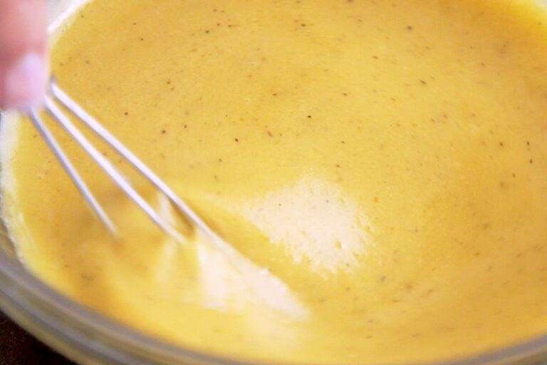 Whisk dressing until smooth and integrated.