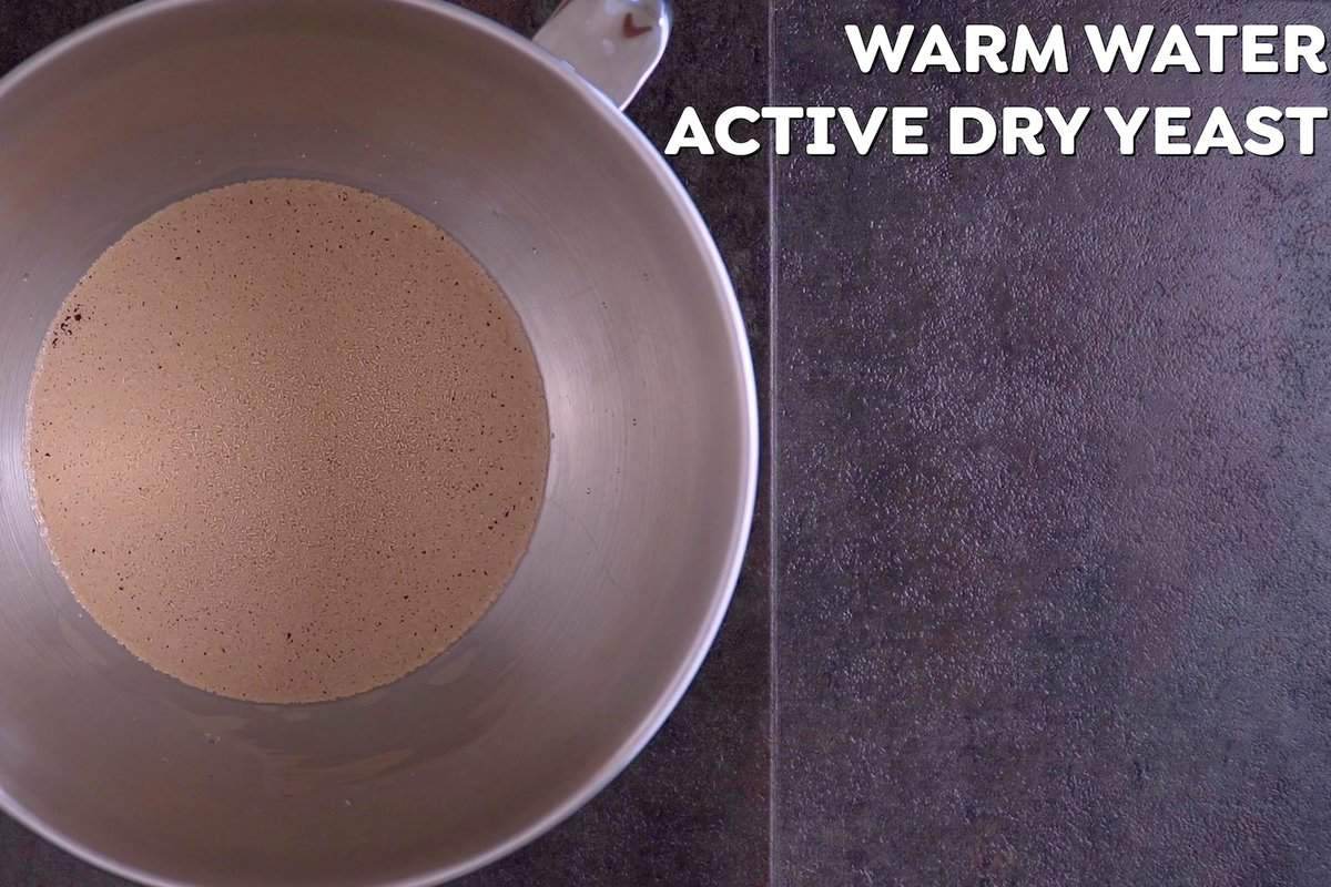Add warm water (105-115°F) to the bowl of the stand mixer and sprinkle active dry yeast on top. (Don't stir!)