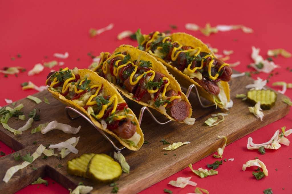 Hot dog in a taco shell