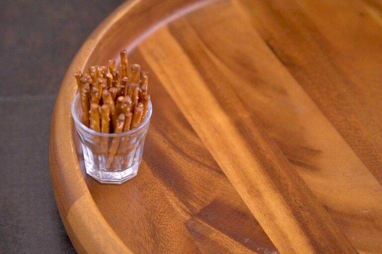 Add small bowls onto the cheese board first.