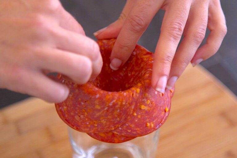 Continue adding layers of meat slices until your flower is as full as you'd like.