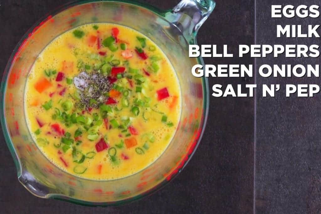 Whisk together eggs, milk, veggies, and seasonings.