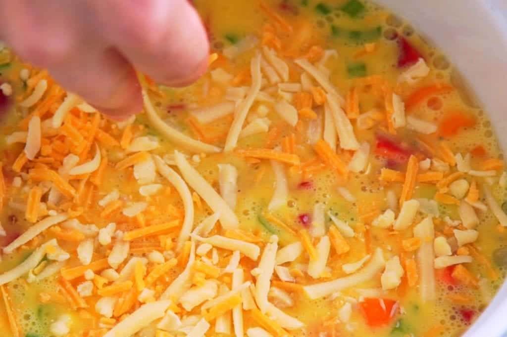 Top instant pot breakfast casserole with cheese.