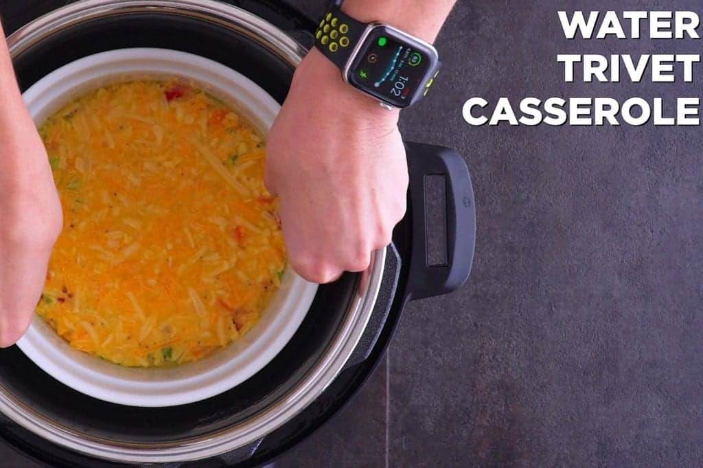 Add water, metal trivet, and casserole dish into instant pot. Close and cook on high pressure 25 minutes.
