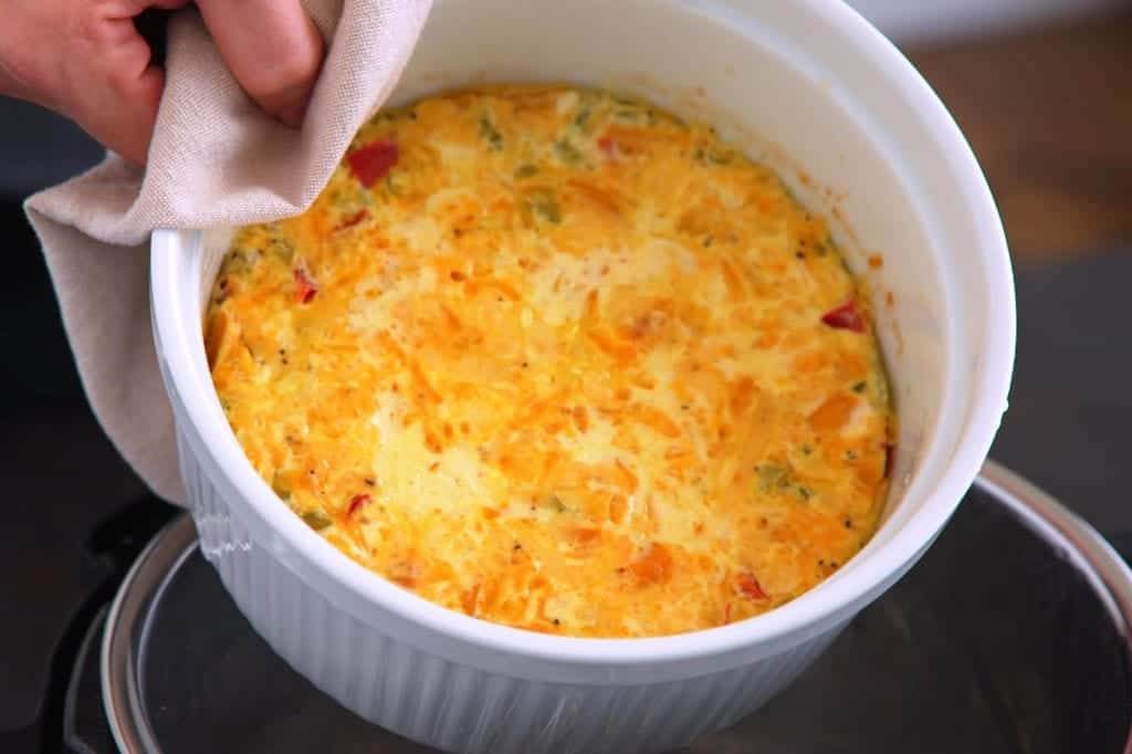 Quick release steam and carefully remove instant pot egg casserole from machine.