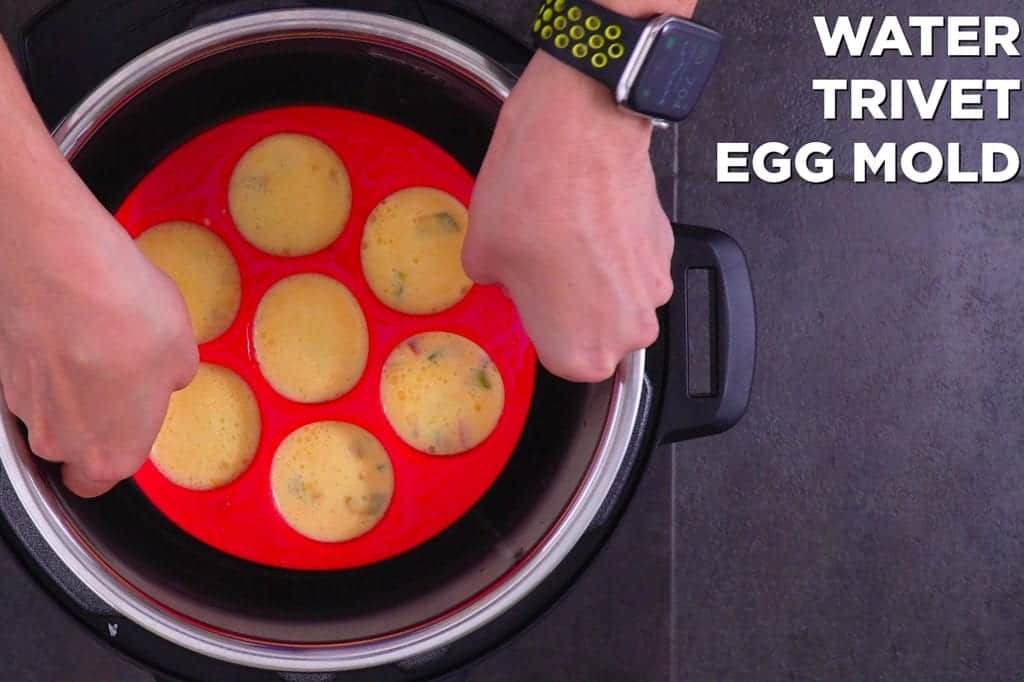 Add water, metal trivet, and filled egg bites mold into instant pot. Cook on "steam" setting for 8 minutes.