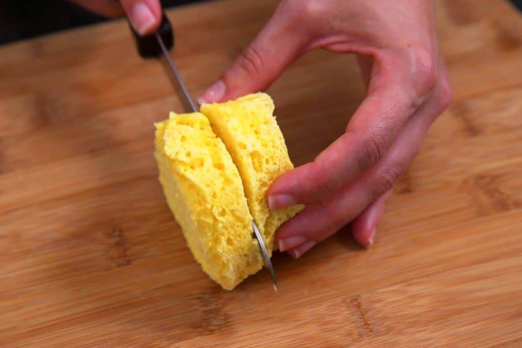 Allow keto biscuit to cool slightly before slicing in half