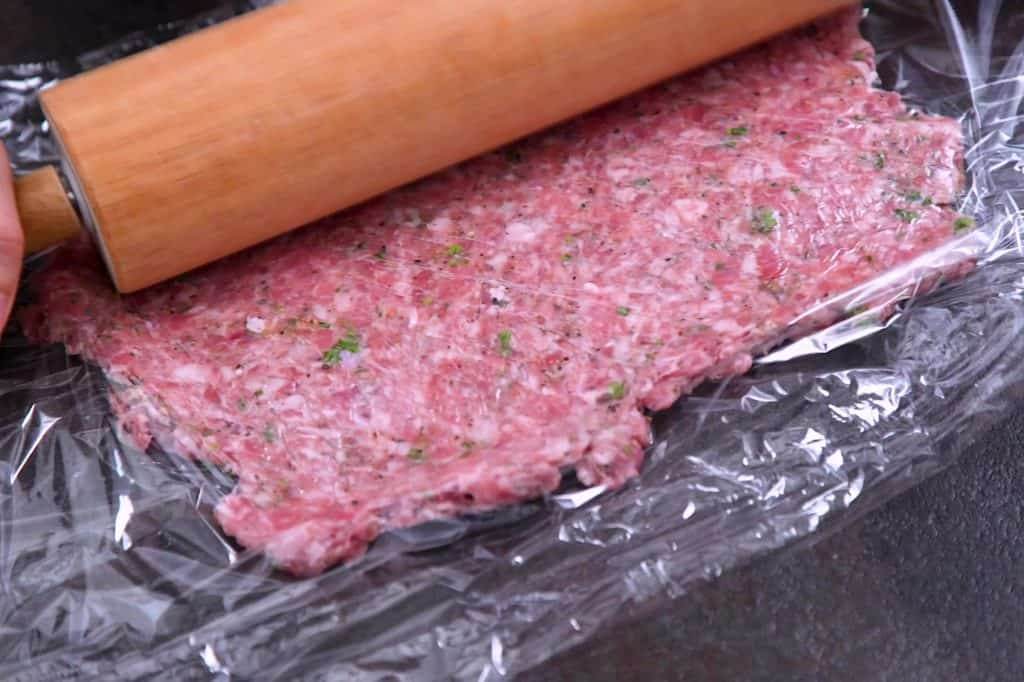Roll out breakfast sausage mixture until about 1/4 inch thick