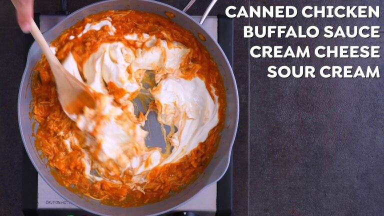 Stirring in cream cheese and sour cream in a pan.