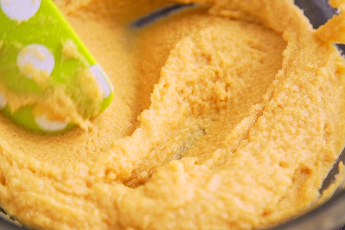 Whisk together dry ingredients and wet ingredients separately. Then, stir dry into wet mixture until integrated, but don't overmix.