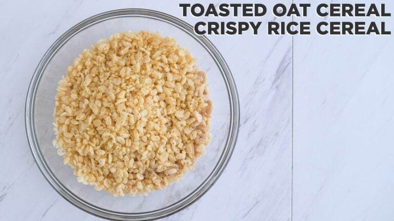 adding cheerios and rice krispies to a bowl to make homemade rice krispy treats.