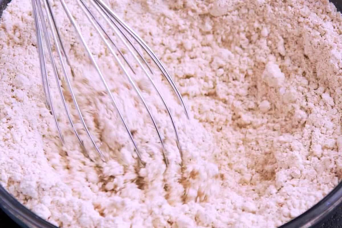 Whisk together oat flour, baking powder, cinnamon, and salt.