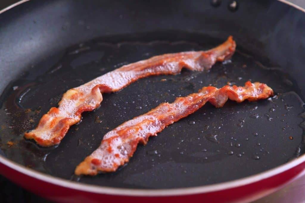 Cook bacon and reserve some of bacon fat to cook pan seared scallops