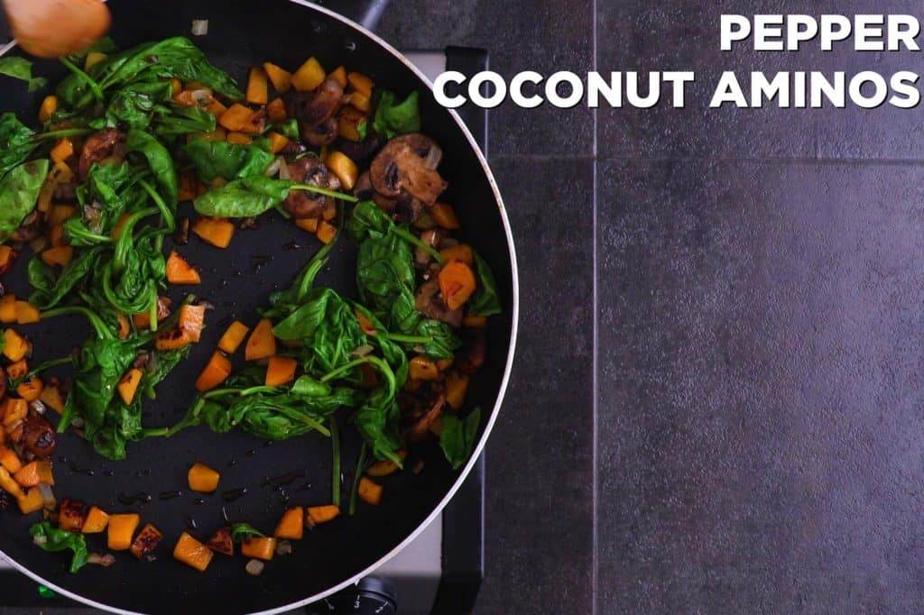 Season to taste with black pepper and coconut aminos, stirring in chopped bacon at the end.