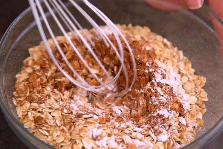 In a bowl, whisk together oats and other dry ingredients.