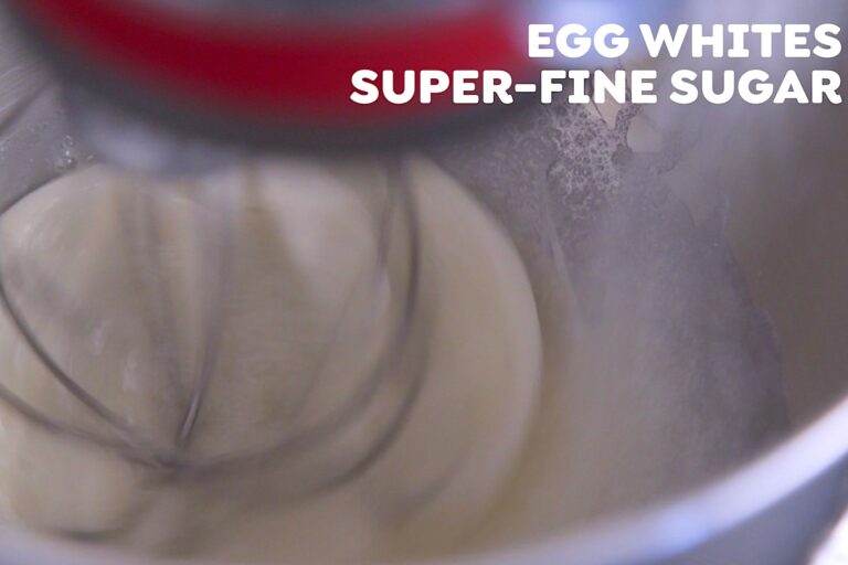First, the egg whites will turn white and creamy, with soft peaks that slump.