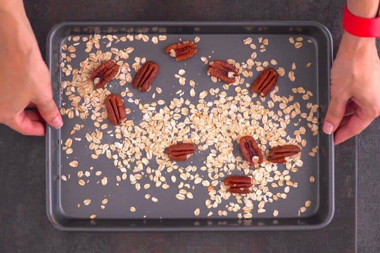Toast pecans & rolled oats at 350°F (180°C) for 10-12 minutes, stirring occasionally.