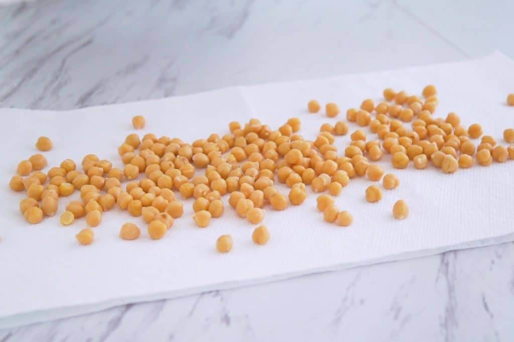 Healthy Ranch Roasted Chickpeas, how to roast chickpeas, ranch chickpeas, baked chickpeas, roasted canned chickpeas, oven roasted chickpeas, easy vegan snacks, healthy snack ideas, baked garbanzo beans, crunchy roasted chickpeas recipe, travel snacks
