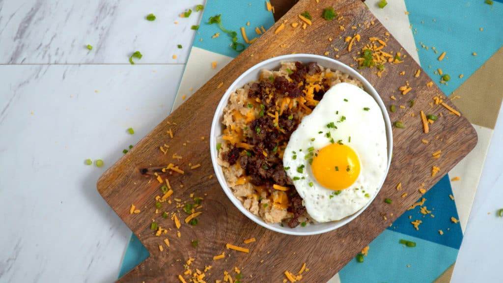 Sausage Egg Cheese Savory Oatmeal, oatmeal with fried egg, cheese oatmeal, oatmeal sausage, oatmeal mix ins, savory oatmeal egg sausage cheese, salty oatmeal, savory breakfast ideas