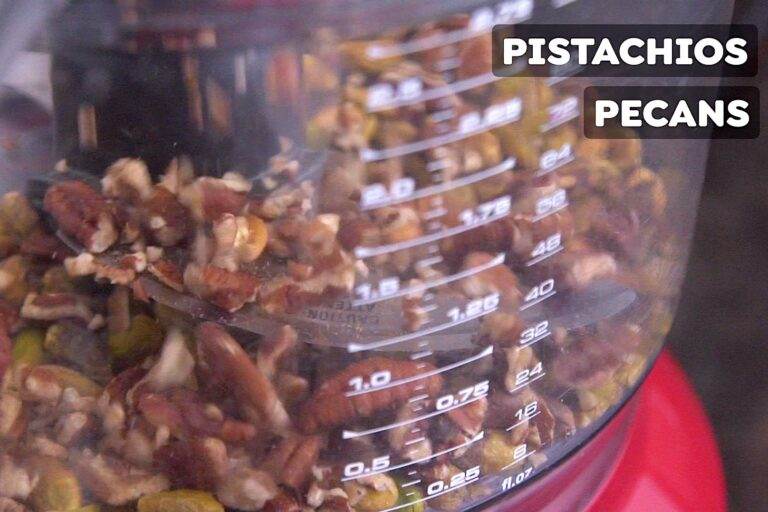 Use a food processor to pulse pecans and pistachios until finely chopped.