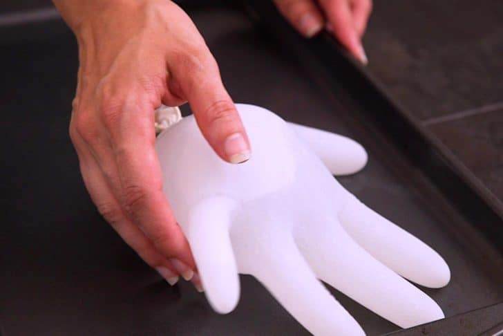 Pour tonic water into food safe gloves and tie them off like water balloons. Lay flat on a tray and freeze for 3-4 hours.