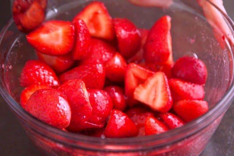Allow strawberries to macerate for 30-60 minutes to enhance flavor and draw out their sweet juices.